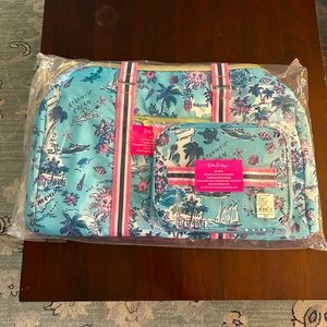 Brand new makeup bag and travel bag. Really pretty!